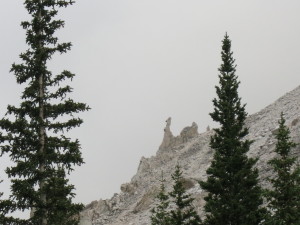 An interesting rock formation stands out against gray skies on the Jones Peak ridge.
